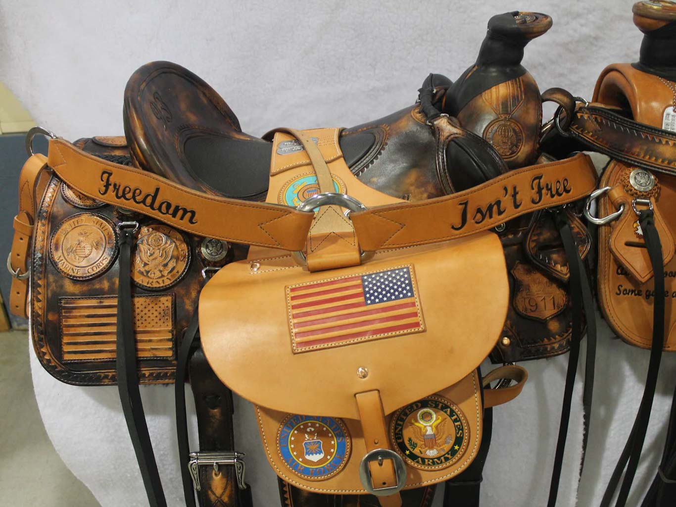 Custom 9/11 Saddle with military, police, and fire insignia