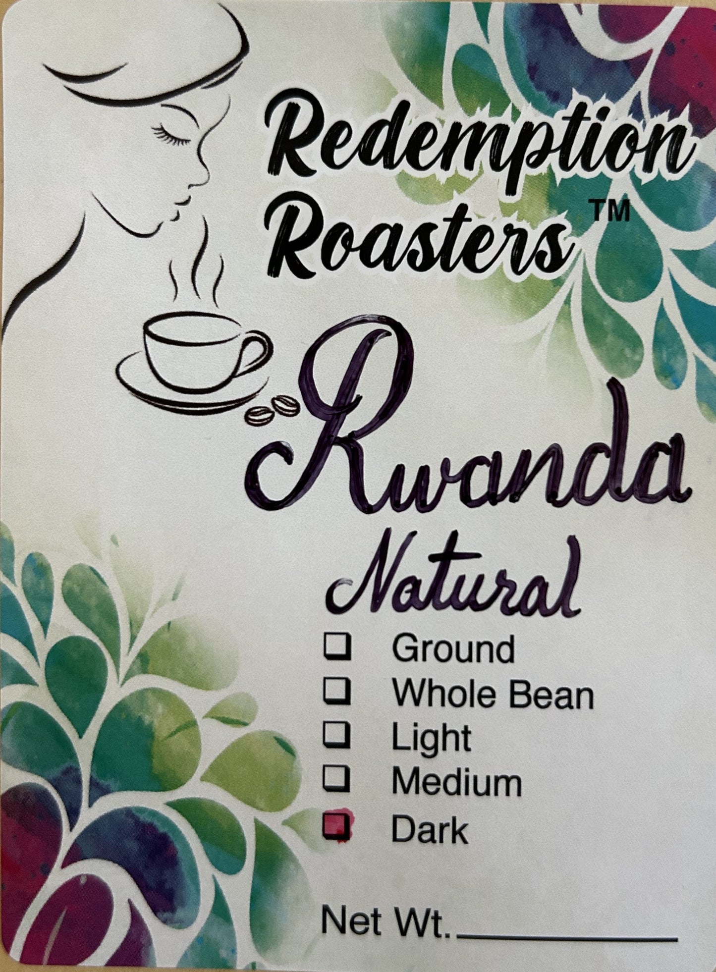 redemption roasters label with image of woman enjoying coffee aroma
